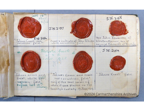 Image from above of page containing wax seal impressions.
