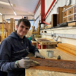 Cai prepping some woodwork